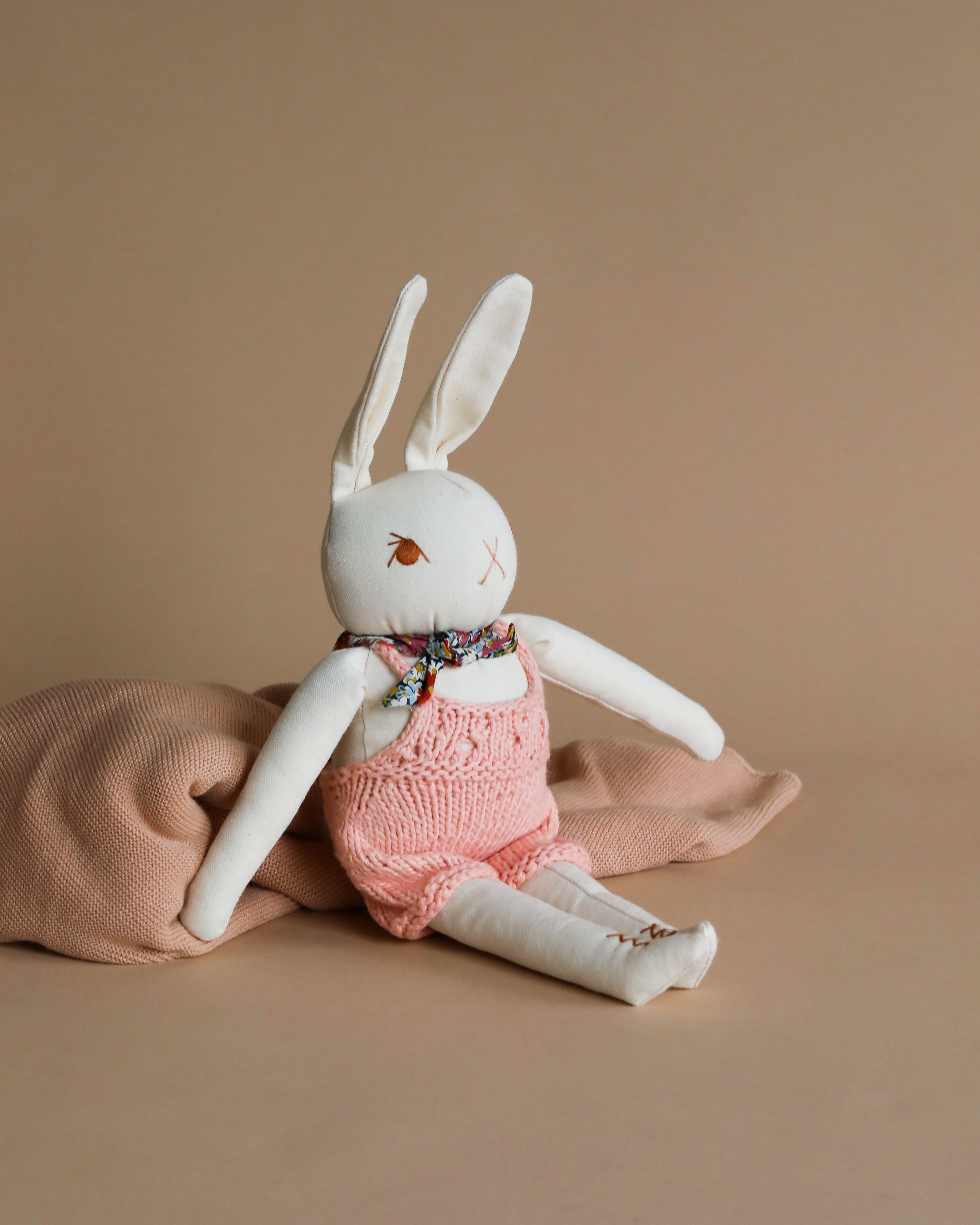 Cream Rabbit in Hand Knit Overalls